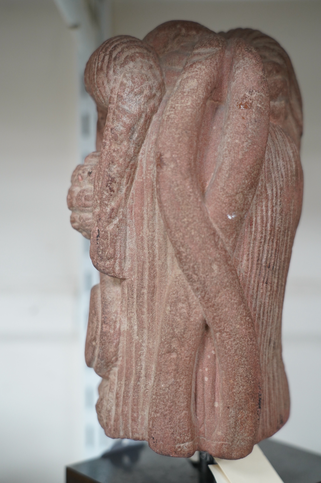 A red stone head of Ardhanarishvara, Muthura region, India, Gupta period, c.5th century A.D.